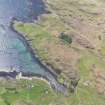 Oblique aerial view of the harbour on Muck, taken from the NNE.