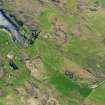 Oblique aerial view of the remains of Sean Bhaile, Muck, taken from the N.