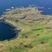 General oblique aerial view of the Island of Muck looking towards the western end of the island, taken from the ENE.