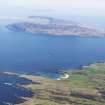 General oblique aerial view of the Islands of Muck and Eigg, taken from the SW.
