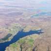 General oblique aerial view of Dunvegan and Kilmuir, looking SE towards the Cuillins, Isle of Skye, taken from the NW.