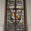 Interior. First floor, upper hall, detail of stained window above fireplace