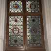 Interior.  First floor, upper hall, detail of stained window on east wall