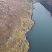 General oblique aerial view of the remains of the townships of Lechcan, West Tarbert and Tota Glas, with associated head dyke and piers on the shores of Loch a' Siar, looking towards Tarbert, Harris, taken from the NW.