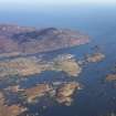 General oblique aerial view of the possible remains of a monastic settlement on Pabbay, Loch Baghasdal, looking towards Loch Boisdale, taken from the SW.