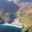 General oblique aerial view of the remains of the township and field system at Mingulay Bay, Mingulay, taken from the E.