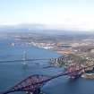 General oblique aerial view of North Queensferry with the Forth Bridges in the foreground, taken from the ESE.