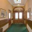 Interior. View of player's entrance hallway, looking back to entrance door.