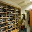 Interior. View of the shoe room adjacent to the men's locker room in Muirfield golf course.