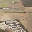 Oblique aerial view of the soilmarks of the rig and furrow at Edzell Airfield, taken from the SSW.