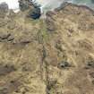 Oblique aerial view of the remains of the township and field systems at Reidh an Daraich on the Knoydart Peninsula and  the remains of a fish trap at Sandaig, taken from the ENE.