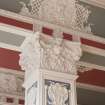 Interior. Ground floor.  Marryat Hall.  Detail of column capital with ceiling decoration above.