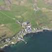 General oblique aerial view of Bruichladdich, Islay, taken from the SE.
