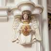 Interior. Detail of angel corbel on chancel arch.