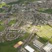 General oblique aerial view of Cumnock centred on the site of the former railway station, taken from the SSE.