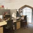 Mezzanine. Offices. Specimen bay with arched window.