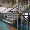 Interior. View of principal staircase and balustrade from mid-landing, NW range.