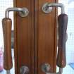 Detail. View of sample door handles on corridor doors, NW range.