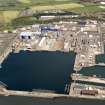 Oblique aerial view of HM Dockyard main basin Rosyth, taken from the S.