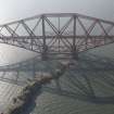 Oblique aerial view of one of the spans of the Forth Rail Bridge with Inch Garvie in the foreground, looking WSW.