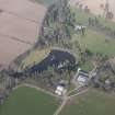 Oblique aerial view centred on Ecclesmagirdle House, looking NE.