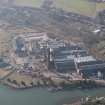 Oblique aerial view of Caldwells Mill, Inverkeithing, looking W.
