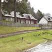 Cottages and boat house to west of hotel, view from north east