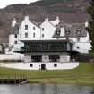 View from the north bank of the River Tay looking south to the rear elevations and modern extension to the Kenmore Hotel.