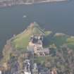 Oblique aerial view of Linlithgow Palace and St Michael's Church, looking N.