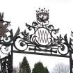 South gate leading to garden. Decorative ironwork.