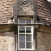 Detail of east dormer window with carved stone pediment at 2nd floor level of south facade, Ardkinglas House.