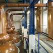 Interior. Still house, view of copper stills