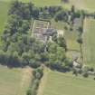 Oblique aerial view of Balmanno House, taken from the NNE.