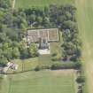 Oblique aerial view of Balmanno House, taken from the NW.