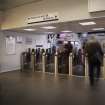 View of ticket barriers into entrance hall.
