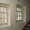 Interior, detail of windows at stairway groundfloor, SW house.