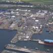 Oblique aerial view of Rosyth Dockyard, taken from the SSW.