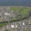 General oblique aerial view of Musselburgh centred on New Bridge, taken from the SE.