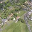 Oblique aerial view of St Andrew's Church, taken from the SSW.