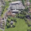 Oblique aerial view of Belhaven Brewery, taken from the NW.