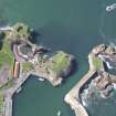 Oblique aerial view of Dunbar Castle, taken from the E.