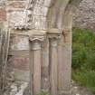 Details of capitals and dog-tooth detail on arch.