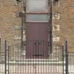 View of hoodmoulded front entrance doorway on the south east elevation of Fullarton Parish Church.