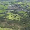 General oblique aerial view of Comrie centred on the golf course, taken from the N.