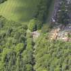 Oblique aerial view of Yester House lodges and gate piers, taken from the SE.
