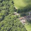 Oblique aerial view of Yester House lodges and gate piers, taken from the ENE.