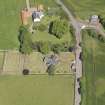 Oblique aerial view of Spott Parish Church, taken from the SW.