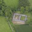 Oblique aerial view of Wedderburn Castle stable block, taken from the NNW.