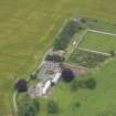 Oblique aerial view of Nisbet House and walled garden, taken from the SW.