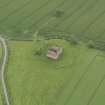 Oblique aerial view of Cessford Castle, taken from the W.